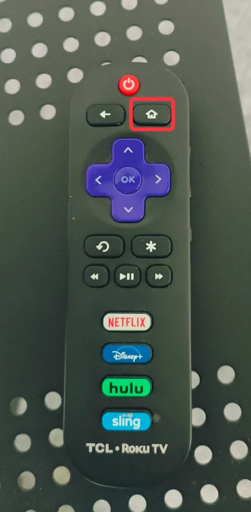 locate the Home button on the Roku remote