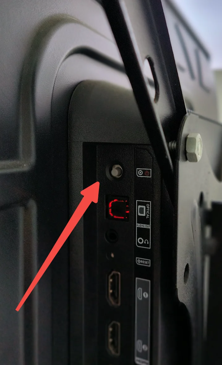 the small protruding power button on TCL Roku TV